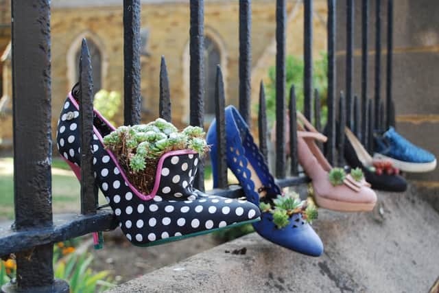 In Bloom judges visit Northampton, 2018. Shoe planters in St Giles.
