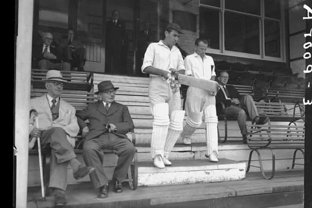 Glamorgan County Cricket Club batsmen make way their way down the pavilion steps to face Northants at the County Ground in 1959