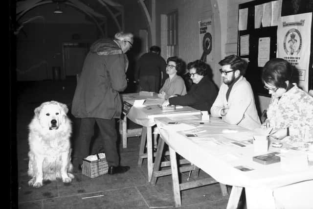 A competitor waits to register for a dog show at the Drill Hall, Clare Street, Northampton, March 14, 1970