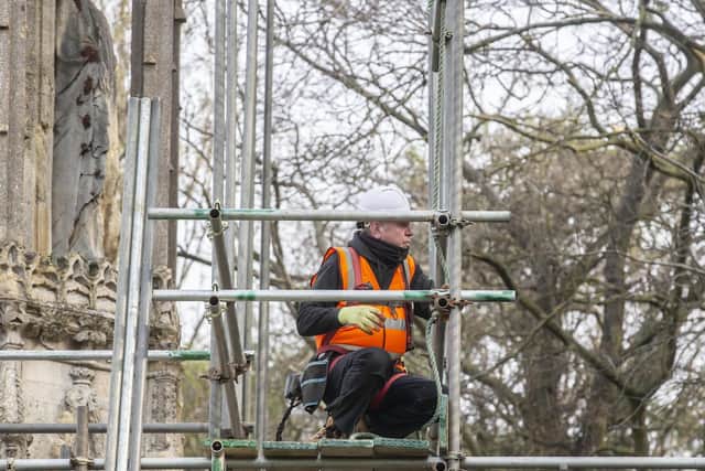 Work has started to secure the crumbling Eleanor Cross in London Road.