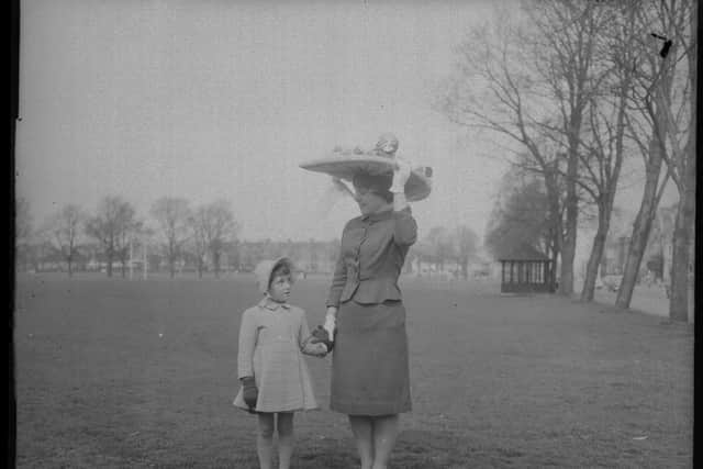 Easter Bonnet wearers prepared for a parade on The Racecourse, Northampton, April 23, 1962