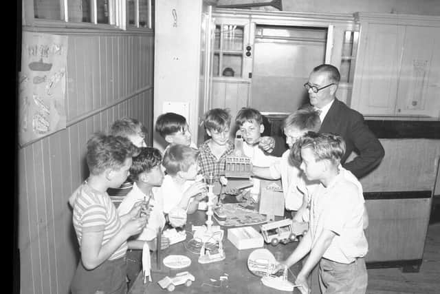 Pupils of All Saints School, Northampton show headmaster Nogger Norton their models in July 6, 1959