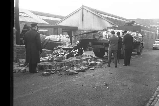 Baby Jane Woodward escaped serious injury when a wall collapsed on her sturdy pram in Ash Street, Northampton in 1966