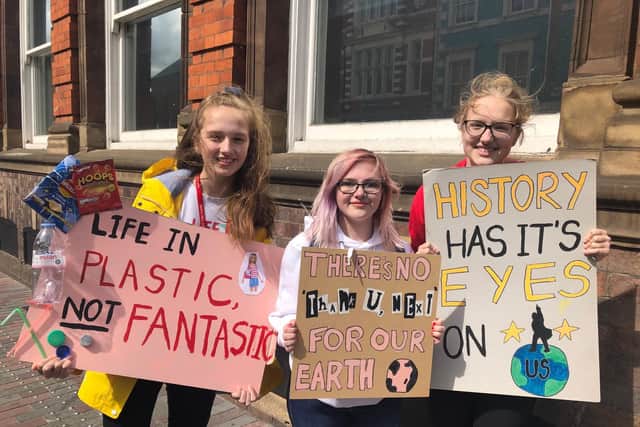 Pictured from left-right eco march organisers and speakers: NSG student Mia Joice, 18, Northampton College student Lorna Lewis, 18, and NSG student Ava Joice, 14.