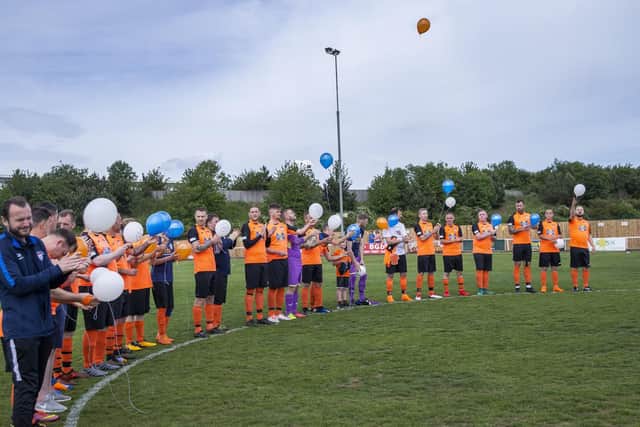 Biodegradable balloons were released into the sky to remember the players' little ones, and each balloon had a special message on for them. Pictures taken by Kirsty Edmonds.