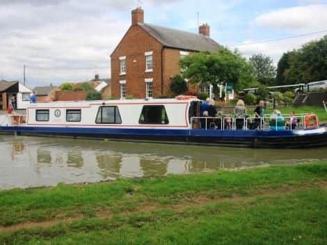 Towcester Road / High Street junction. Canal bridge Blisworth. Adjacent to Blisworth Mill