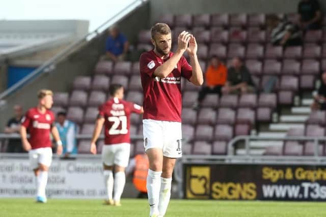 Andy Williams accepts the applause as he is substituted
