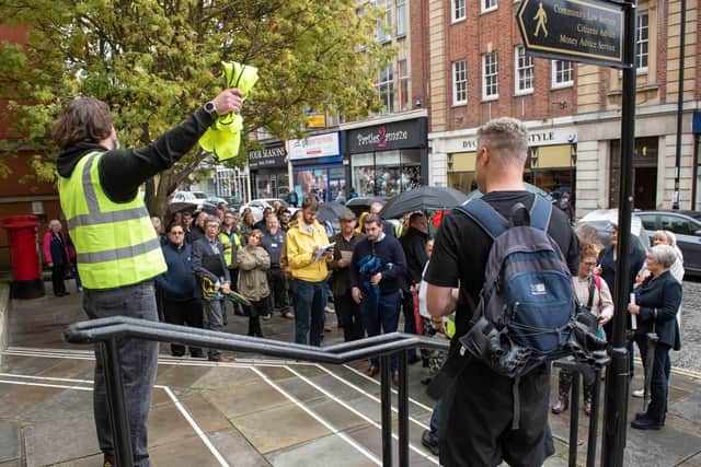 St Gile's Ale House owner Terry Steers called for the march over a proposed hike in parking charges.