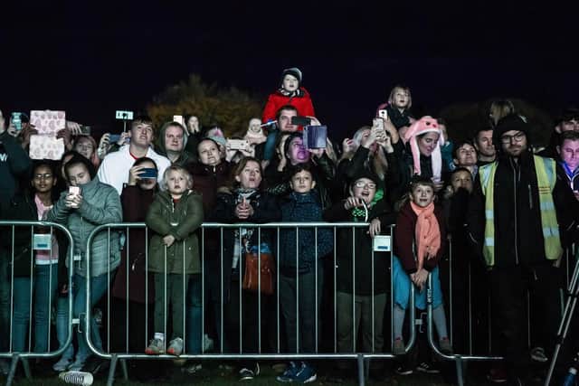 Crowds enjoy the fireworks at The Racecourse