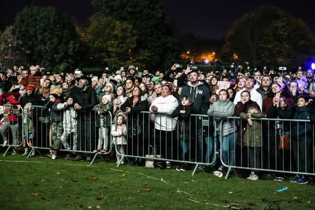 Crowds enjoy the fireworks at The Racecourse