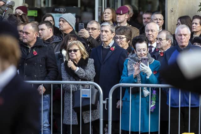 Hundreds of people met in the town centre to watch the parade and take part in the service.
