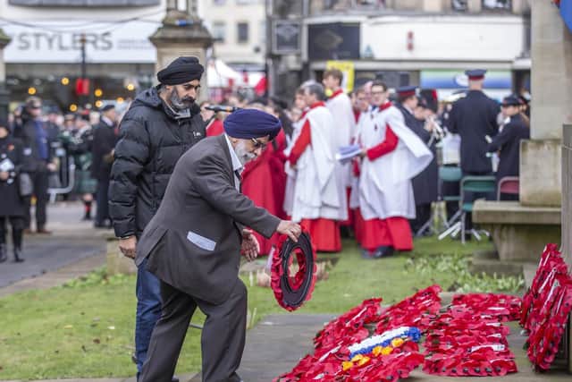 Dozens of wreaths were laid at the town's war memorial.