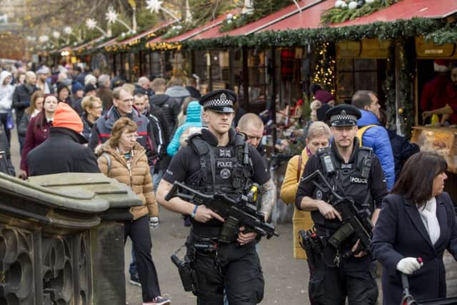 Armed Police on patrol at Christmas market