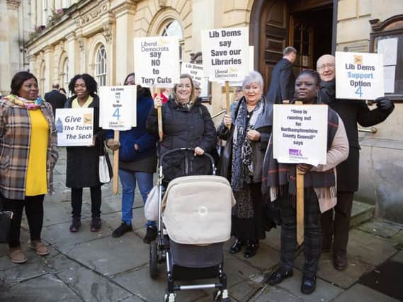 A protest group gathered outside county hall to support "option four".