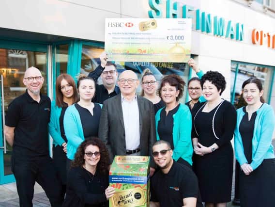 The team at Sheinman Opticians launch this year's Golden Ticket promotion by Northampton Town Centre Business Improvement District