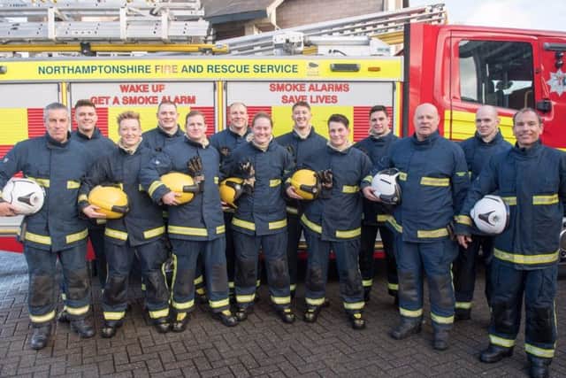 The new NFRS recruits (yellow helmets) with their NFRS trainers (white helmets) NNL-170112-102413005