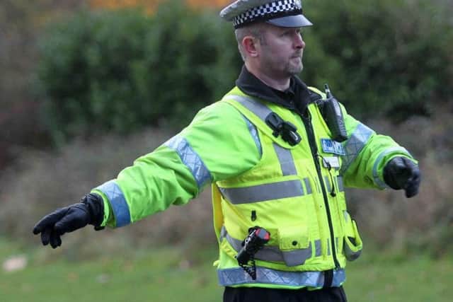 Police officers waving down motorists will be a familiar sight on the morning commute