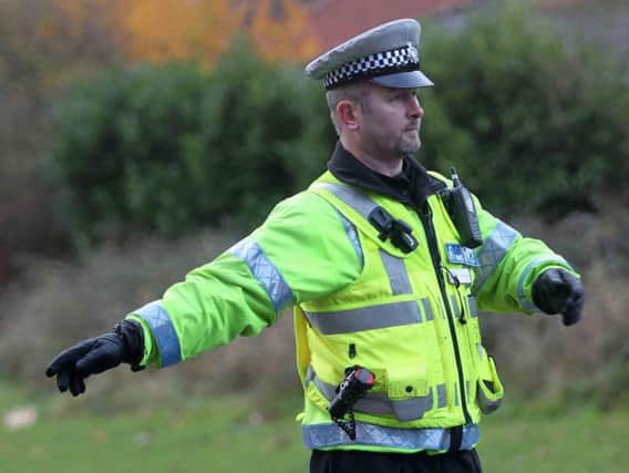 Police officers waving down motorists will be a familiar sight on the morning commute