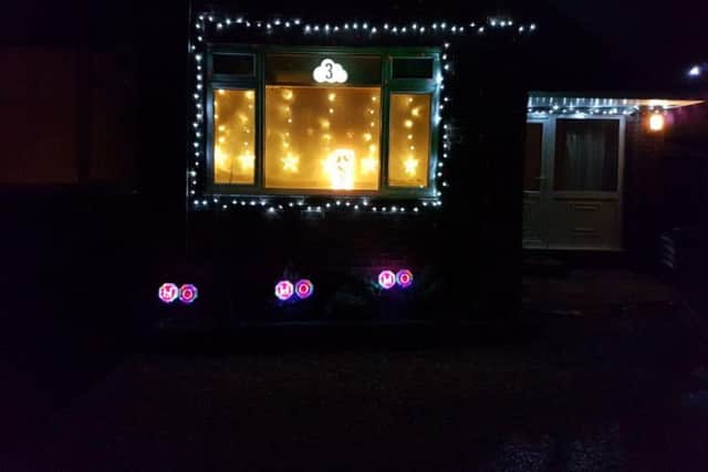 Cat Sabine's window display for the festive advent calendar display in Barby