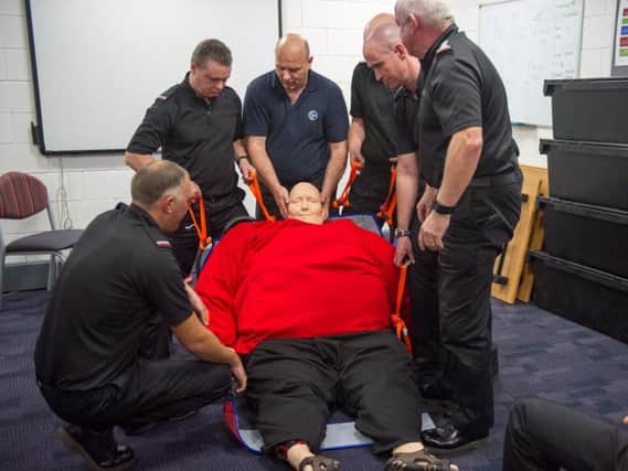 The mannequin is used in a manual handling training refresher for firefighters