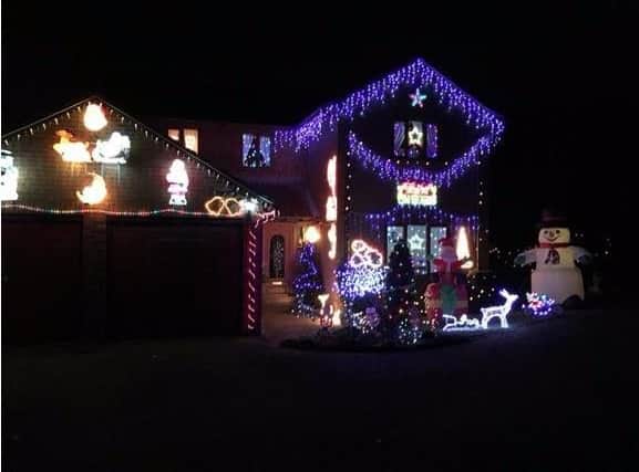 The Phipps family in Duston raise money every year through their Christmas decorations