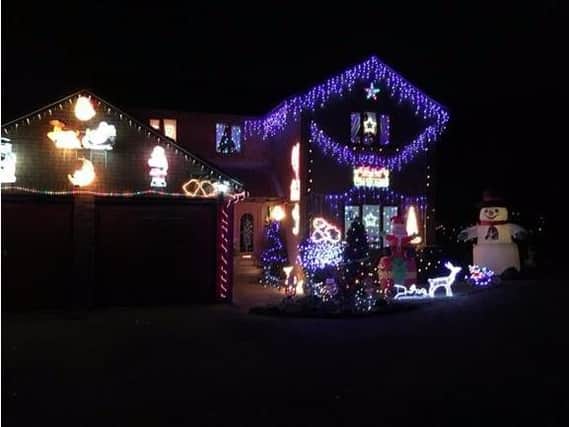 The Phipps family in Duston raise money every year through their Christmas decorations