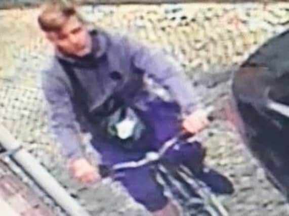 The man pictured may be connected to an incident of theft and criminal damage.