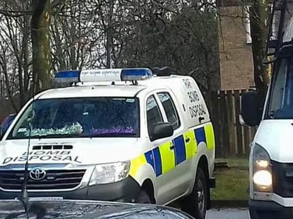 A bomb disposal unit and a police van at Shadowfax Drive this afternoon.