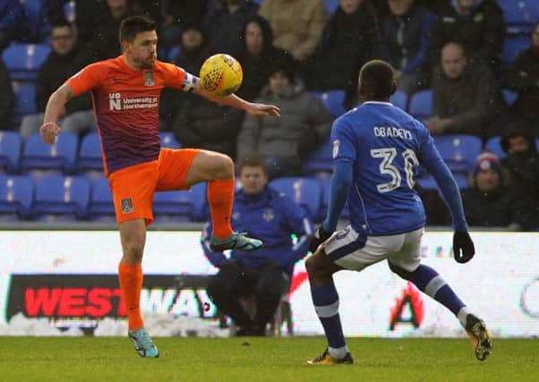 Dave Buchanan in action during the Cobblers' defeat at Oldham