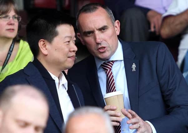 Cobblers chairman Kelvin Thomas and 5USport chief executive Tom Auyeung