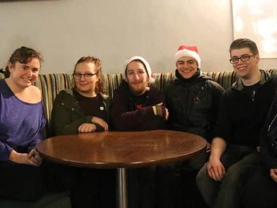 These students helped to put a roof over rough sleepers during the wintry weather.