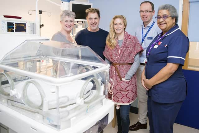 Pictured L-R: Jo and Nigel Wagstaff, daughter Julie Blayney, pediatric consultant Dr Nick Barnes and ward manager Grace Rogers.