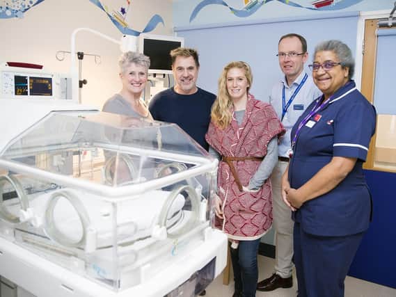 Pictured L-R: Jo and Nigel Wagstaff, daughter Julie Blayney, pediatric consultant Dr Nick Barnes and ward manager Grace Rogers.