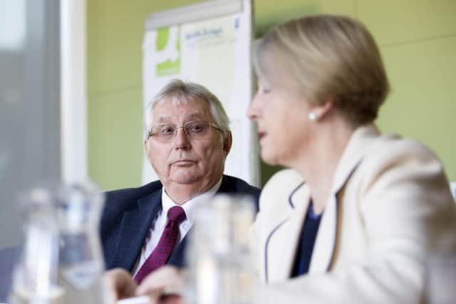 Councillor Robin Brown looks on as Councillor Heather Smith discusses the 2018-19 draft budget proposals. (Picture: Kirsty Edmonds)