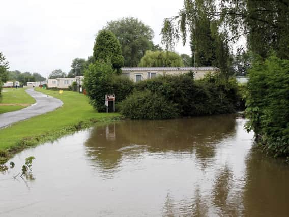 Cogenhoe Mill Caravan Site is subject to a flood warning. Editorial image.