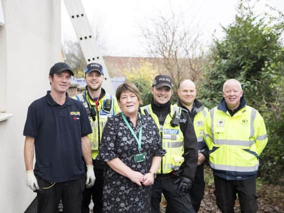 Pictured L-R: Electrician, Martin Hair, PCSO James Wetherall, Theresa Kelly of NAASH, PC Lee Stevens with neighbourhood warderns, Steven Burdett and Robert Strickland.