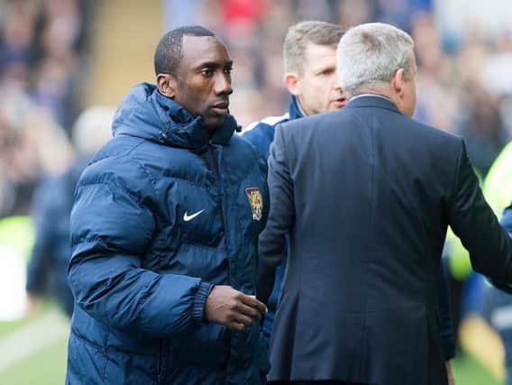Jimmy Floyd Hasselbaink shakes hands with Portsmouth manager Kenny Jackett. Picture by Kirsty Edmonds