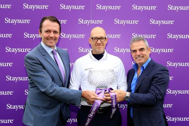 L-R Head of Staysure Tour, David MacClaren, chairman of Staysure, Ryan Howsam and winning 2014 Ryder Cup captain, Paul McGinley.