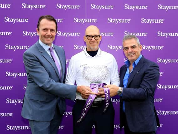 L-R Head of Staysure Tour, David MacClaren, chairman of Staysure, Ryan Howsam and winning 2014 Ryder Cup captain, Paul McGinley.