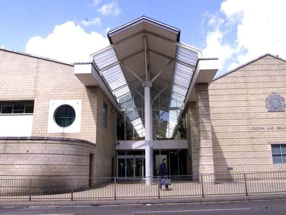 Taishon Whittaker, 26, is on trial for taking part in an incident where members of the public were splashed with ammonia.