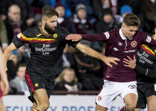 Jordan Turnbull in action for Partick Thistle against Hearts in the Scottish Premiership earlier this season