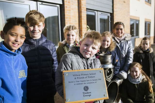 Millway Primary School students helped to bury a time capsule filled with letters, poems and drawings, on the former British Timken Site. Pictures: Kirsty Edmonds.