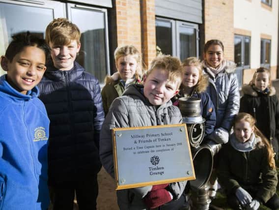 Millway Primary School students helped to bury a time capsule filled with letters, poems and drawings, on the former British Timken Site. Pictures: Kirsty Edmonds.