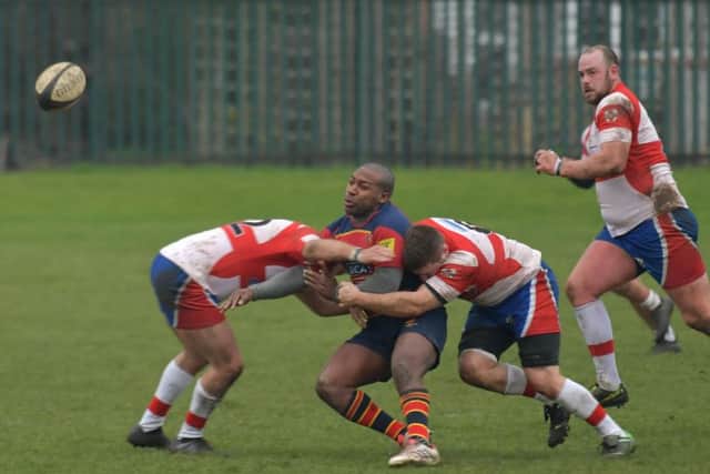 CRUNCHED - action from Old Northamptonians' draw with Wellingborough (Pictures: Dave Ikin)
