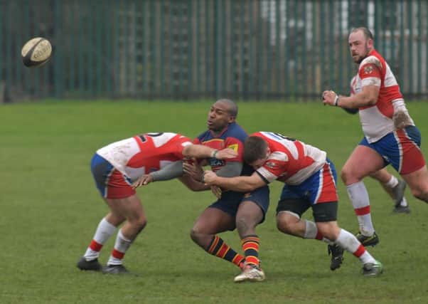 CRUNCHED - action from Old Northamptonians' draw with Wellingborough (Pictures: Dave Ikin)