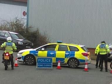Tenter Road has been shut and police are dealing with the situation.