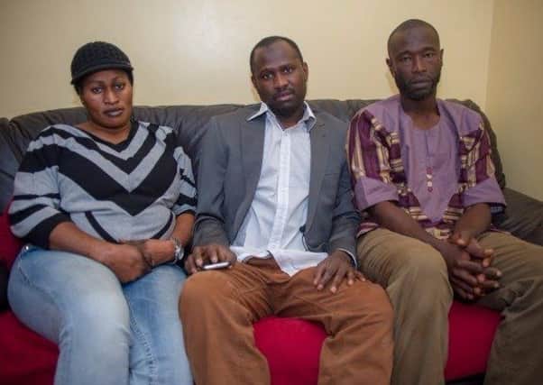 The family of Tairu Jallow, including brother Nuru Jallow (middle)