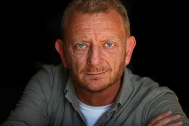 Former Chron photographer Clive Mason