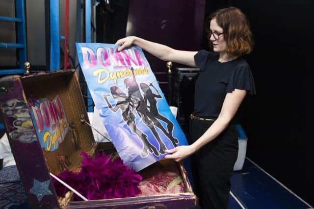 Resident director, Nikki Davis-Jones looks through Donna's old keepsake trunk, filled with fond memories of her youth. The trunk and the props inside are a nod to the finale. Pictures: Kirsty Edmonds.