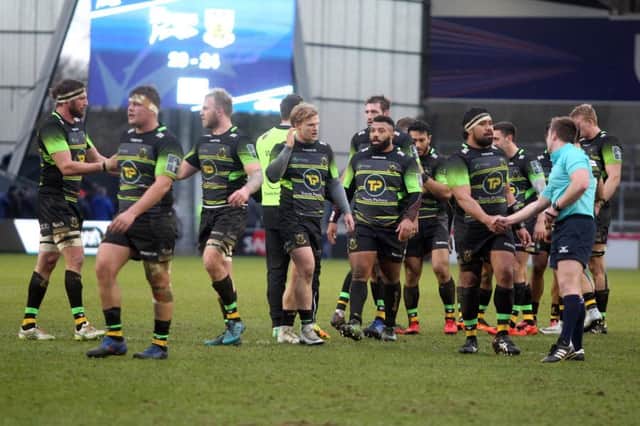 The Saints players celebrate their last-gasp win at Sale
